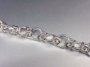 The Seaxwolf Colleen is our formal handcrafted sterling silver Byzantine III chain design variation.