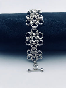 seaXwolf handmade fine jewelry signature HexaFleur Daisy Chain, solid sterling silver chain mail bracelet based on sacred geometry of the hexagon flower.