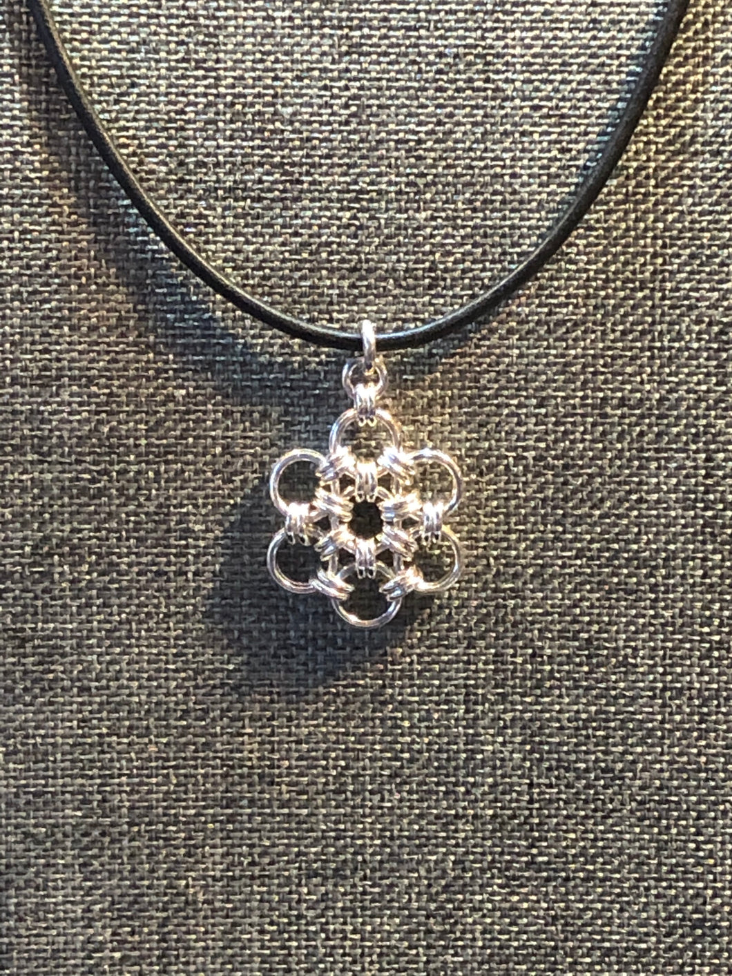 Sterling Silver Snowflake (UItra Fine 20 Gauge) and Black Leather Cord