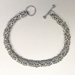 Seaxwolf artisanal 18 gauge handmade 925 sterling silver Byzantine chain bracelet with toggle clasp.