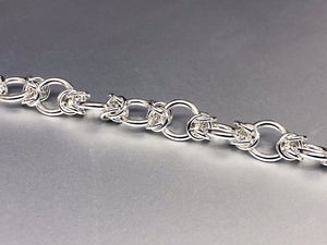 Seaxwolf Colleen is our intricate handcrafted sterling silver Byzantine chain bracelet variation.