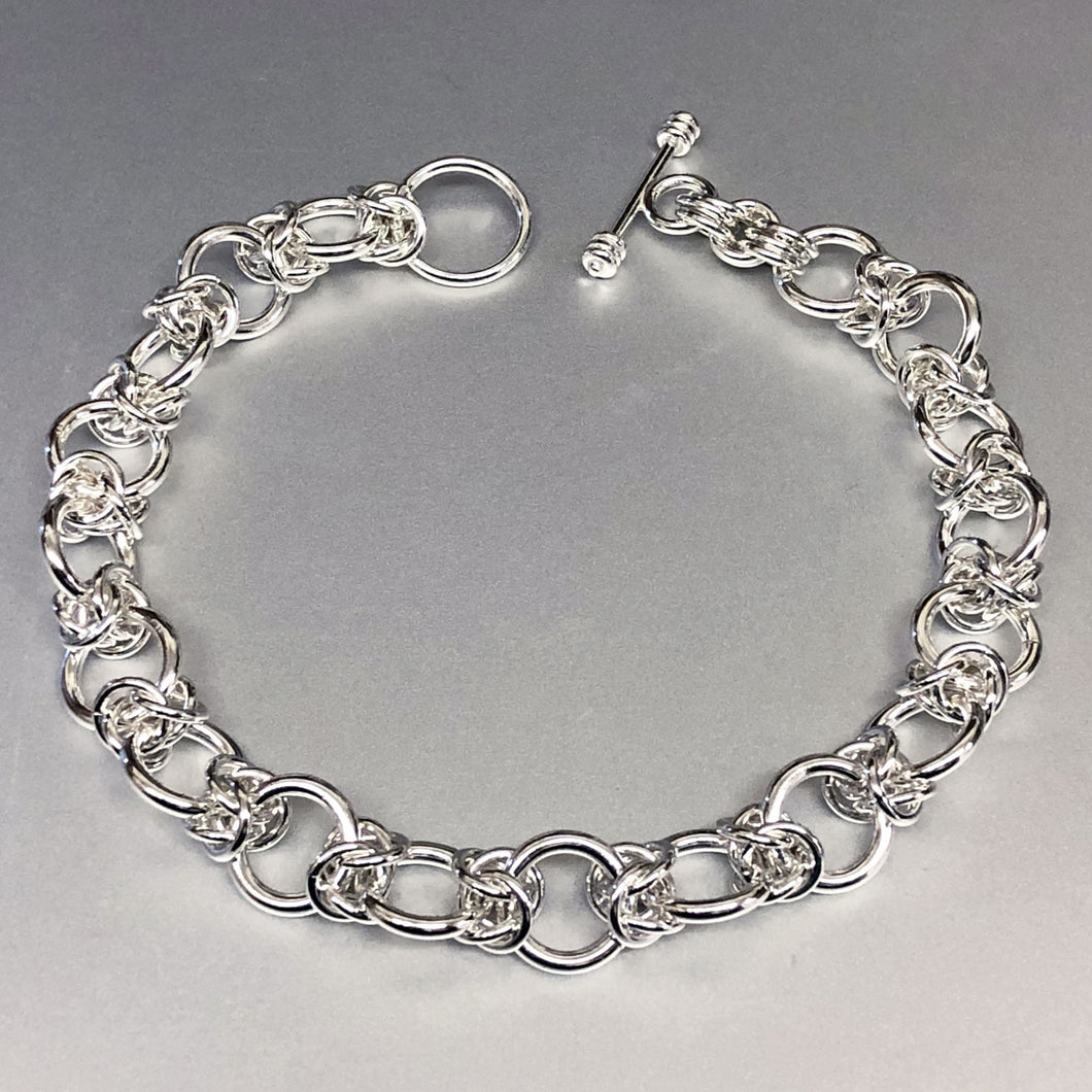The Seaxwolf Colleen is our unique fine handcrafted sterling silver Byzantine III bracelet design variation.