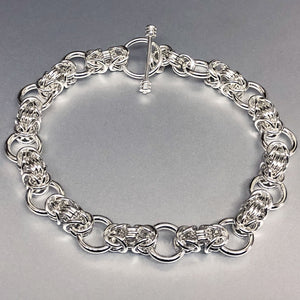 The Seaxwolf Collette is  handcrafted from solid sterling silver Byzantine III bracelet unique variation.