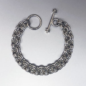 Seaxwolf handcrafted super chunky sterling silver 12 gauge double link bracelet with designer clasp for men and women.