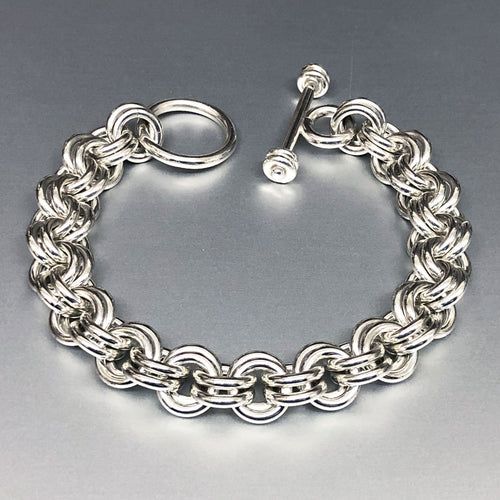 Seaxwolf handcrafted extra chunky sterling silver 12 gauge double link bracelet with designer clasp for men and women.