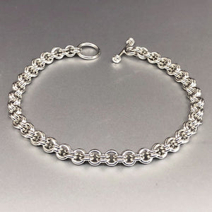 Seaxwolf handmade solid sterling silver double link thin bracelet for men and women.