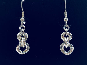 seaXwolf fine handmade jewelry solid sterling silver chain earrings entitled "Twisted Roses" because they look like a tiny voluptuous bouquet of budding roses.