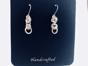 Packaging view of seaXwolf handmade fine jewelry triple twist solid sterling silver chain earrings
